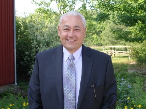 AlanKFossiWestmorelandLandTrust Alan Fossi, head and shoulders shot, wearing a blue suit and tie